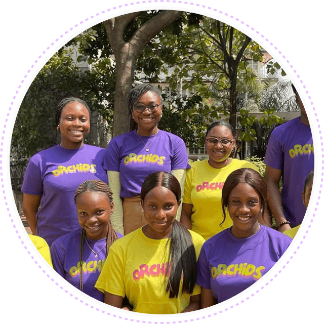Orchids team members wearing purple and yellow branded t-shirts